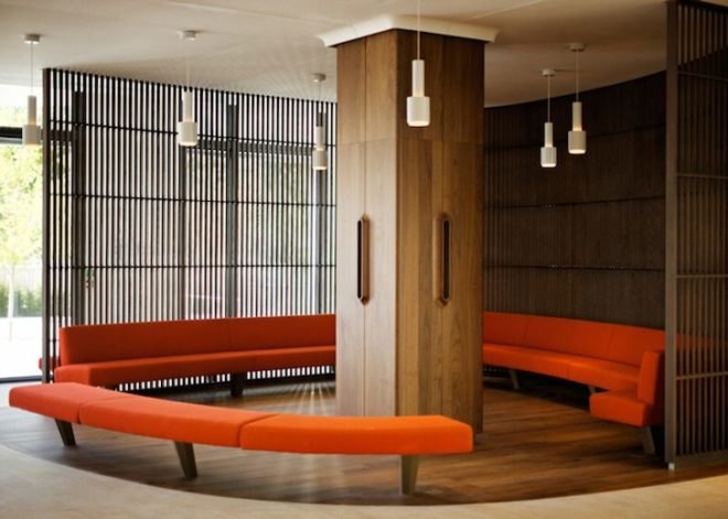 Agence Jouin Manku, office space, amenities wing, Société Foncière Lyonnaise, IN/OUT, iridescent shingles, stainless steel tiles, glass pavilion, bush hammered concrete, contemporary architecture, avant garde architecture
