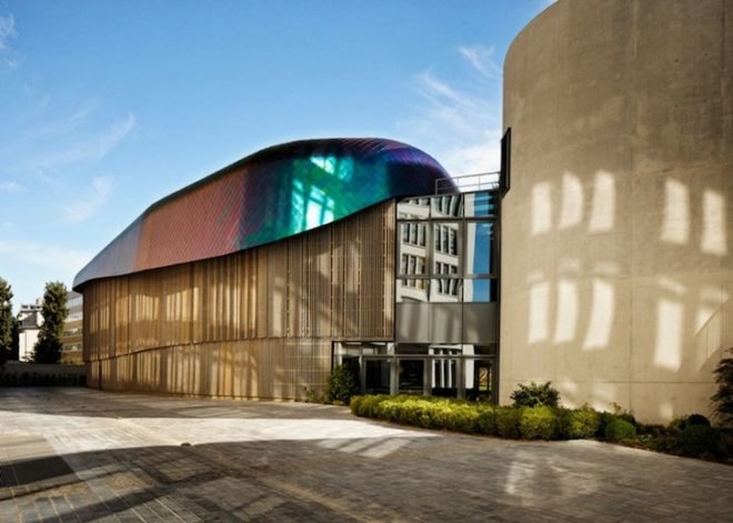 Agence Jouin Manku, office space, amenities wing, Société Foncière Lyonnaise, IN/OUT, iridescent shingles, stainless steel tiles, glass pavilion, bush hammered concrete, contemporary architecture, avant garde architecture