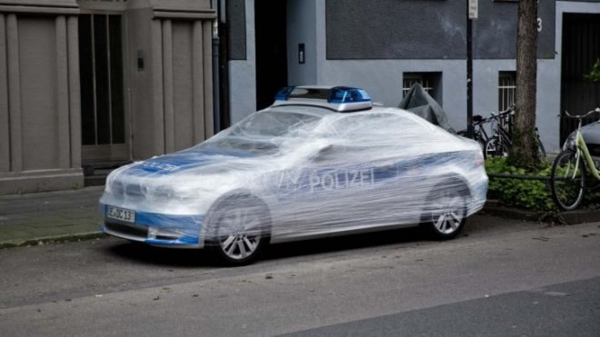SpY German Police Car in Cologne, Germany , street art, urban art, urban street artists, Cologne street art, street art in Germany