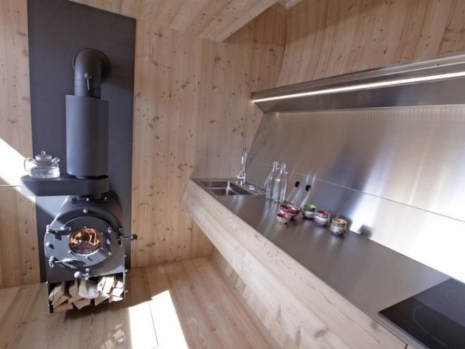 Peter Jungmann, Tiny Cabin, Tiny Home, Tiny House, Tiny Holiday Home, Tiny Holiday Cabin, Uvogel, ufogel, tiny house, holiday home, Tyrolean Mountains, larch wood, austrian landscape, minimalist design, wooden shower, wood burning stove, compact wood house, compact house, tiny home