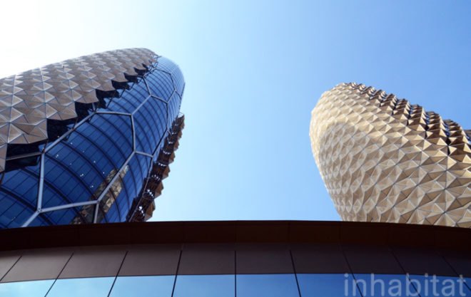Abu Dhabi, world's largest computerized facade, Abu Dhabi Investment Council, Al Hilal Bank, Aedas Architects, external shading structures, twin towers of Abu Dhabi, mashrabiya screens, Abu Dhabi green design, LEED silver buildings in Abu Dhabi, LEED, green construction, award-winning architecture, Middle East, Gulf Region LEED, green building Gulf Region, energy efficiency, daylighting, reduce solar gain