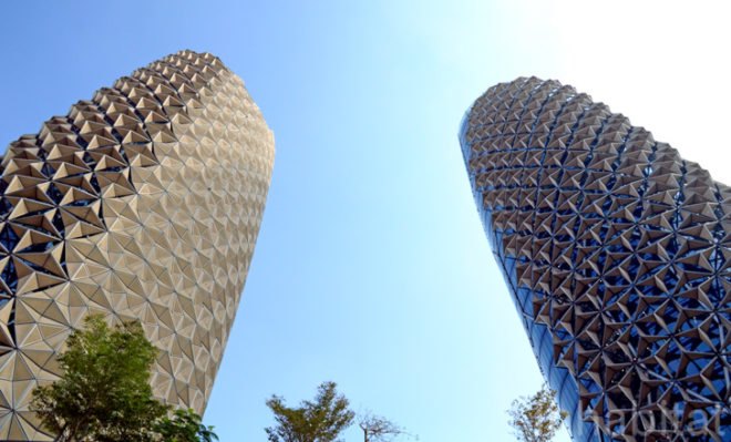 Abu Dhabi, world's largest computerized facade, Abu Dhabi Investment Council, Al Hilal Bank, Aedas Architects, external shading structures, twin towers of Abu Dhabi, mashrabiya screens, Abu Dhabi green design, LEED silver buildings in Abu Dhabi, LEED, green construction, award-winning architecture, Middle East, Gulf Region LEED, green building Gulf Region, energy efficiency, daylighting, reduce solar gain