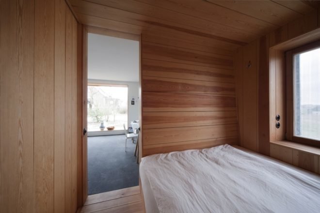 Thomas Kröger, metal-clad house, agricultural cooperative, werkhouse, iron skin, minimalist house, workshop and house, corrugated metal facade, wood chip boiler, german countryside,