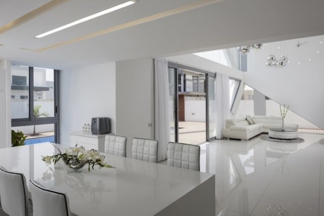 Zahavi Architects, House in Ashdod, ashdod, porthole windows, porcelain granite, sunrise portal, natural light, solar panels, water recycling system, open floor plan