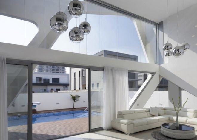 Zahavi Architects, House in Ashdod, ashdod, porthole windows, porcelain granite, sunrise portal, natural light, solar panels, water recycling system, open floor plan
