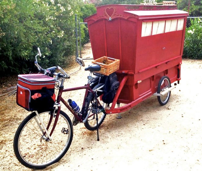 Barry Howard, architecture, tiny homes,micro wagon, bicycle micro gypsy wagon, sustainable materials, bicycle wagon, green transporation, traveling artist, little red artist's wagon