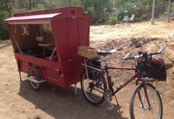 Barry Howard, architecture, tiny homes,micro wagon, bicycle micro gypsy wagon, sustainable materials, bicycle wagon, green transporation, traveling artist, little red artist's wagon