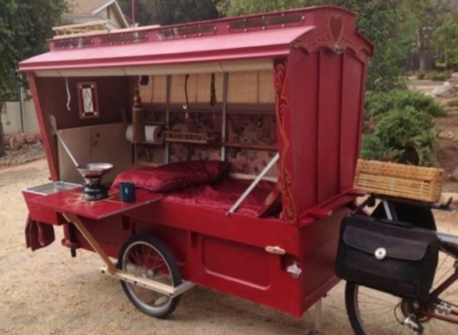Barry Howard, architecture, tiny homes,micro wagon, bicycle micro gypsy wagon, sustainable materials, bicycle wagon, green transporation, traveling artist, little red artist's wagon