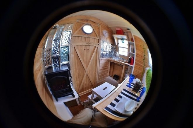 hobbit hutch, tiny home, gypsy caravan, writer's studio, james mangum, jalousie windows, fairytale home, faux wood stove, tractor supply trailer, cassette toilet, propane shower