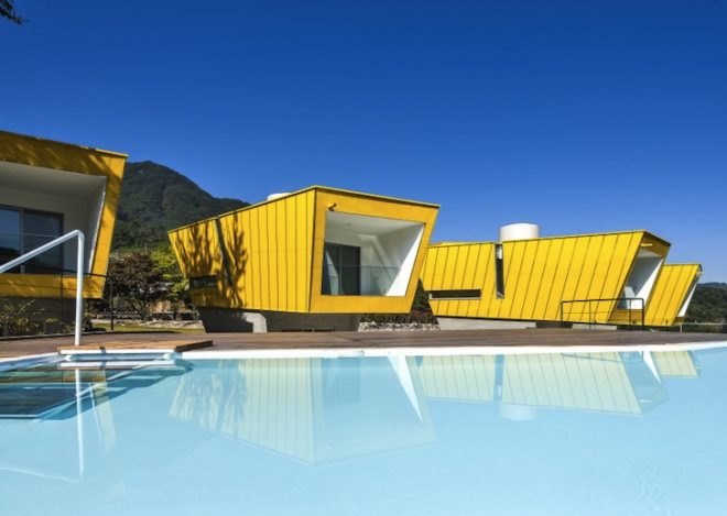 Studio Koossino, easter island, moai statues, holiday homes, gapyeong arboretum, asymmetrical buildings, guesthouses, yellow buildings, trapezoidal windows, korean architecture, Moai pension