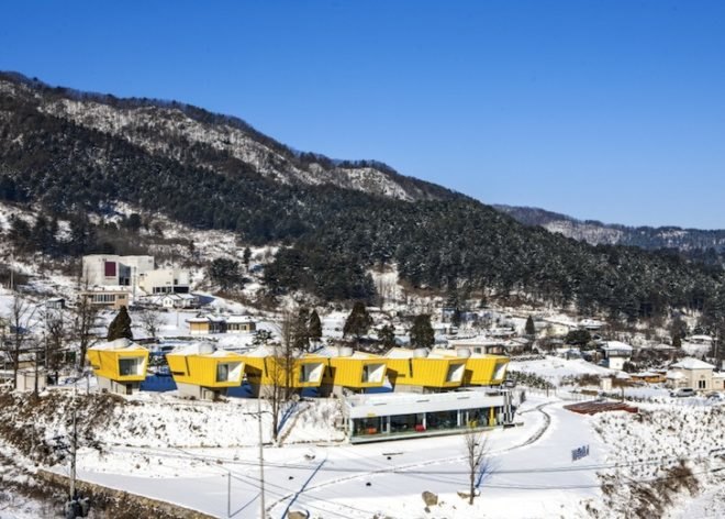 Studio Koossino, easter island, moai statues, holiday homes, gapyeong arboretum, asymmetrical buildings, guesthouses, yellow buildings, trapezoidal windows, korean architecture, Moai pension