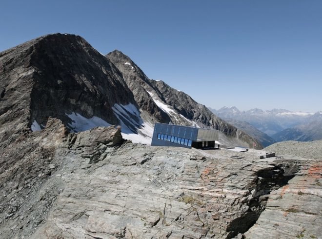 alpine hut, solar power, tracuit hut, switzerland, mountaineering, swiss alps, Savioz Fabrizzi Architectes, valais alps, bishorn, prefabricated hut, southern exposure, solar panels, stainless steel cladding, alpine climate, alpine architecture