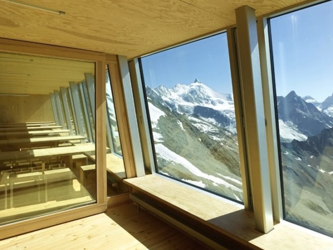 alpine hut, solar power, tracuit hut, switzerland, mountaineering, swiss alps, Savioz Fabrizzi Architectes, valais alps, bishorn, prefabricated hut, southern exposure, solar panels, stainless steel cladding, alpine climate, alpine architecture