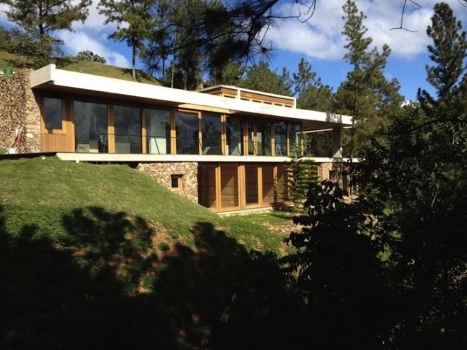 vasho, vasho architects, rd house, energy efficiency, green roofs, home automation, dominican republic, natural insulation, summer house, locally sourced wood, exposed concrete, excavated rock, steep topography