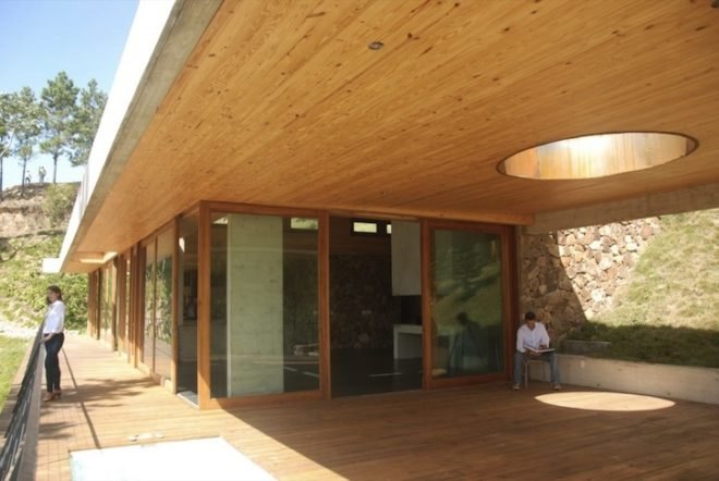 vasho, vasho architects, rd house, energy efficiency, green roofs, home automation, dominican republic, natural insulation, summer house, locally sourced wood, exposed concrete, excavated rock, steep topography