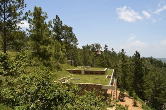 vasho, vasho architects, rd house, energy efficiency, green roofs, home automation, dominican republic, natural insulation, summer house, locally sourced wood, exposed concrete, excavated rock, steep topography