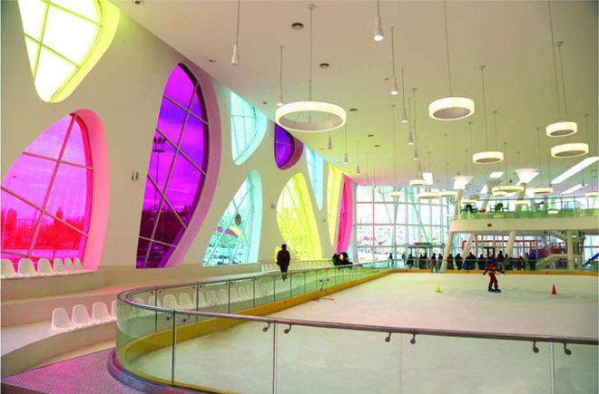 Bahadir Kul Architects, kayseri ice rink, ice rink, blob-shaped windows, turkey, kayseri, anatolian wonderland, tourism hub, mezzanine level, colorful windows, futuristic facade