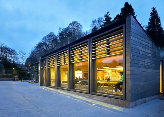 John McAslan + Partners, University of Cumbria, coverted Cumbrian barn, student center renovation cumbira, renovation, architecture, campus design, repurposed materials, landscape architecture, timber roofs, university design, UK campus redesign