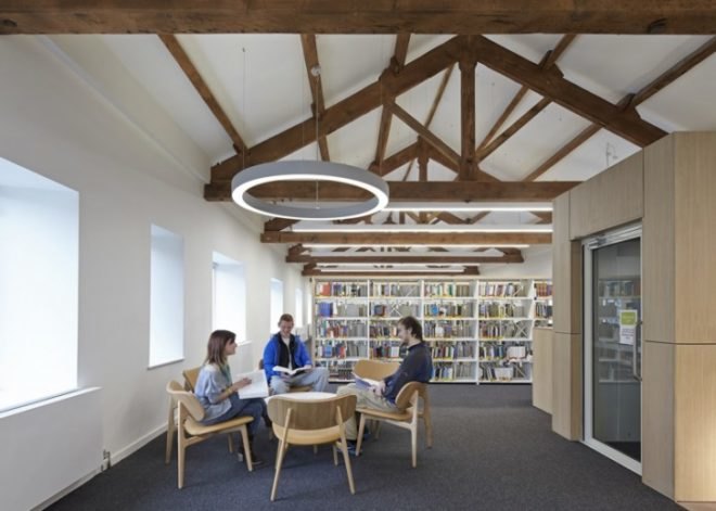 John McAslan + Partners, University of Cumbria, coverted Cumbrian barn, student center renovation cumbira, renovation, architecture, campus design, repurposed materials, landscape architecture, timber roofs, university design, UK campus redesign