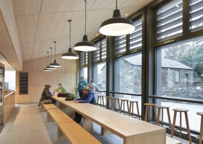 John McAslan + Partners, University of Cumbria, coverted Cumbrian barn, student center renovation cumbira, renovation, architecture, campus design, repurposed materials, landscape architecture, timber roofs, university design, UK campus redesign