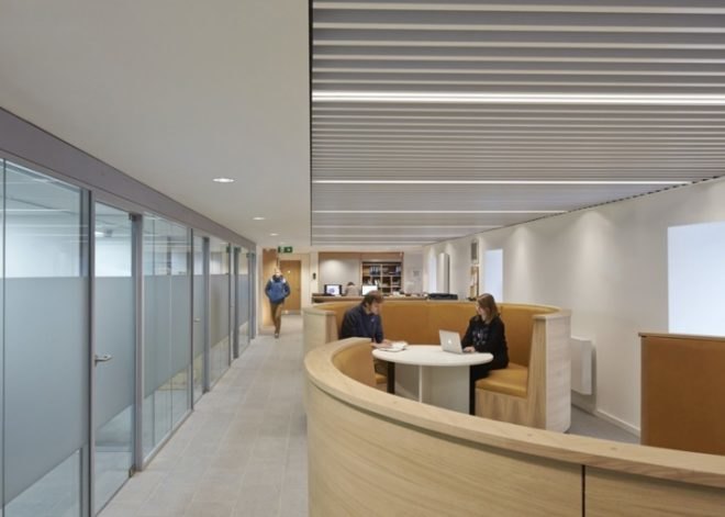 John McAslan + Partners, University of Cumbria, coverted Cumbrian barn, student center renovation cumbira, renovation, architecture, campus design, repurposed materials, landscape architecture, timber roofs, university design, UK campus redesign