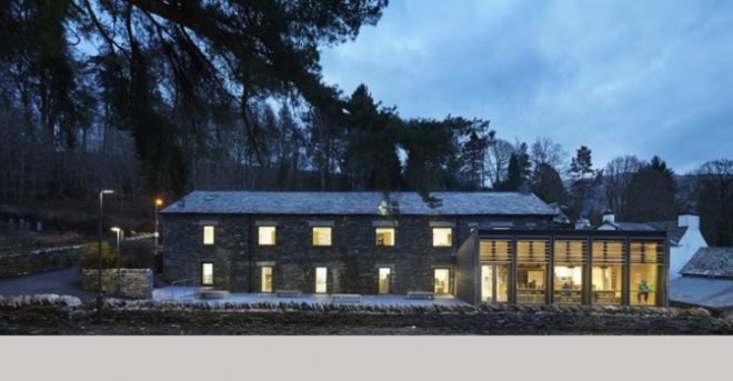John McAslan + Partners, University of Cumbria, coverted Cumbrian barn, student center renovation cumbira, renovation, architecture, campus design, repurposed materials, landscape architecture, timber roofs, university design, UK campus redesign