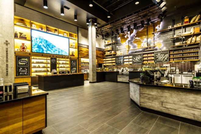 Starbucks Disney store, Starbucks LEED-certified store, LEED certification, LEED platinum cafe, Disneyland Resort Anaheim, reclaimed wood furniture, green walls, interactive installation, Disney-inspired design