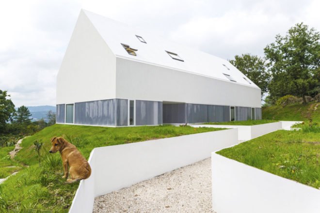 White Wolf Hotel, AND-RÉ hotel, pitched-roof houses, pitched-roof hotels, hotel Portugal, Portuguese architects, holistic design strategy, natural lighting, glass facades, daylit houses, pavilion-like hotels, pavilion architecture