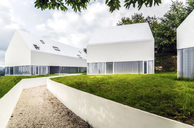 White Wolf Hotel, AND-RÉ hotel, pitched-roof houses, pitched-roof hotels, hotel Portugal, Portuguese architects, holistic design strategy, natural lighting, glass facades, daylit houses, pavilion-like hotels, pavilion architecture