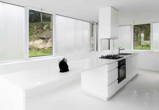 White Wolf Hotel, AND-RÉ hotel, pitched-roof houses, pitched-roof hotels, hotel Portugal, Portuguese architects, holistic design strategy, natural lighting, glass facades, daylit houses, pavilion-like hotels, pavilion architecture