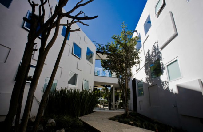 green design, eco design, sustainable design, CRAFT Arquitectos, Adaptive reuse, bronze-glass facade, double skin facade