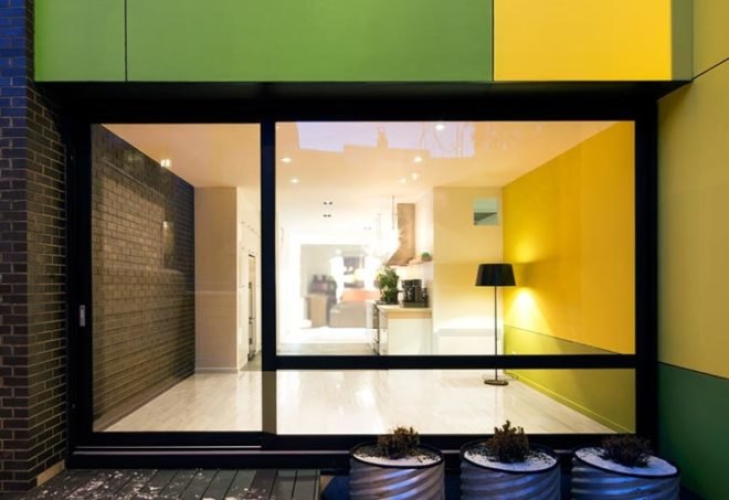 interior renovation, duplex to single-family, montreal, naturehumaine, skylight, daylighting, reclaimed wood, glass floor, historic wooden structure, 8th avenue house, rosemount, colored panels, canada