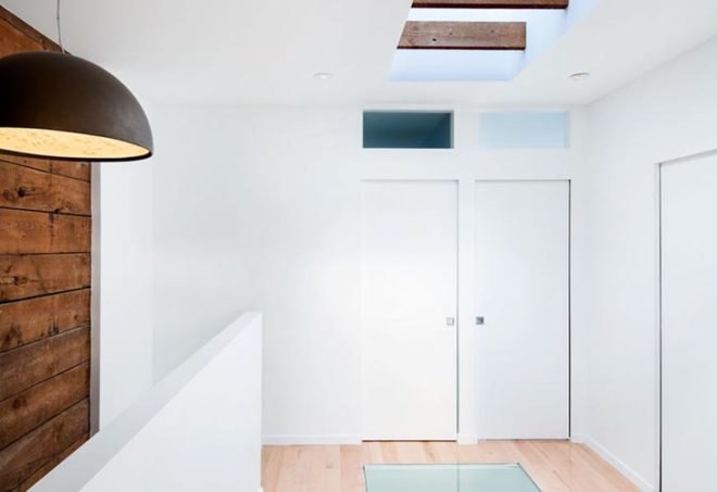 interior renovation, duplex to single-family, montreal, naturehumaine, skylight, daylighting, reclaimed wood, glass floor, historic wooden structure, 8th avenue house, rosemount, colored panels, canada