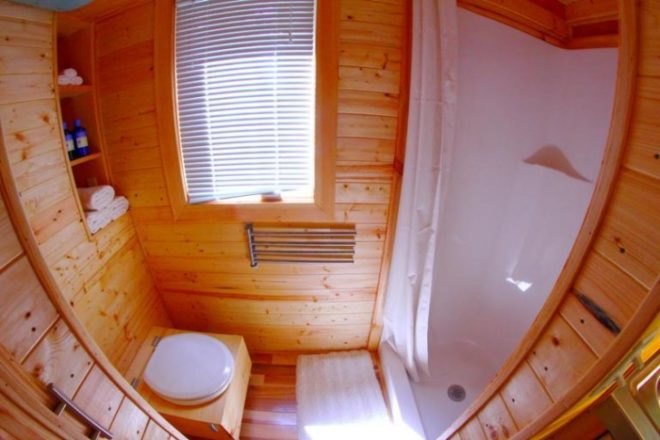 Orange Tiny Home, Vagavond, Vagavond Dwellings, yakisugi exterior, off-grid cabins, energy efficient, solar hot water heater, Oregon Shepherd brand natural wool insulation, architecture, tiny homes, micro homes,