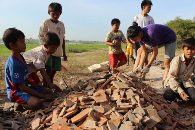 Thom Mun Community Center, Project Little Dream, Cambodia, Architizer A+ Popular Choice Award, New Futures Organisation, bamboo community center, volunteer construction in Cambodia, gabion wall filled with temple ruins, Cambodian community center