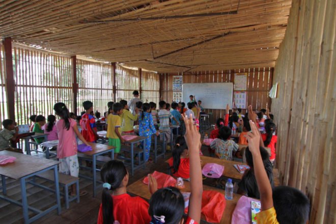 Thom Mun Community Center, Project Little Dream, Cambodia, Architizer A+ Popular Choice Award, New Futures Organisation, bamboo community center, volunteer construction in Cambodia, gabion wall filled with temple ruins, Cambodian community center