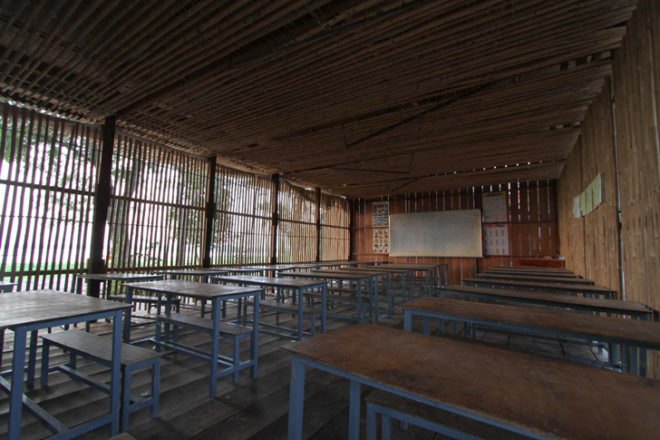 Thom Mun Community Center, Project Little Dream, Cambodia, Architizer A+ Popular Choice Award, New Futures Organisation, bamboo community center, volunteer construction in Cambodia, gabion wall filled with temple ruins, Cambodian community center