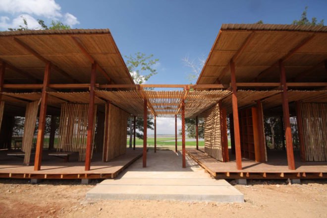 Thom Mun Community Center, Project Little Dream, Cambodia, Architizer A+ Popular Choice Award, New Futures Organisation, bamboo community center, volunteer construction in Cambodia, gabion wall filled with temple ruins, Cambodian community center