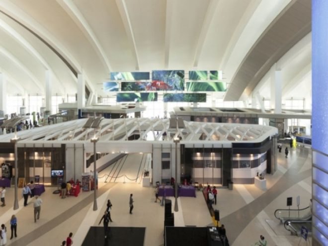 Moment Factory, LAX Installation, Tom Bradley International Terminal, LAX airport design, airport design, interactive media installations, urban desing, architecture, los angeles, MRA International, Sardi Design, largest immersive multimedia system, lighting design, light installations