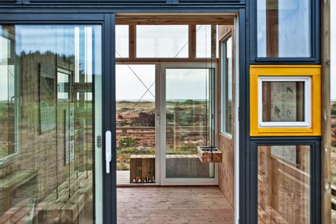 TYIN Tegnestue, Norway, Norwegian wood, low-impact cabin, wooden poles fundations, local materials, recycled windows, Mexican and Norwegian students, Lyset paa Lista, Architecture, Tiny Homes, Recycled Materials, Eco Tourism, Daylighting,