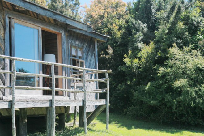 Espejo De Luna, eco-resort Chile, Chilean architecture, eco-travel, eco-hotel Chile, boat-shaped architecture, locally sourced building material, wood architecture, hotel design, resort design, low carbon footprint, carbon emissions, green hotel design