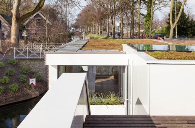 The Netherlands, green roof, bytr architects, parkark, house boat, houseboat, dutch home, dutch architecture, house boat architecture, architecture, white stucco, sedum green roof, skylights,