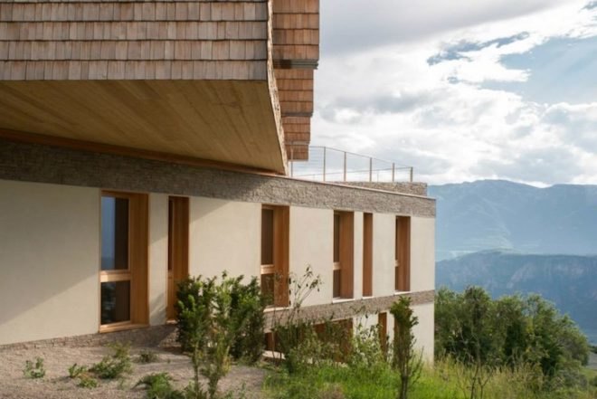 elisabeth and helmut uhl foundation, modo studio, glasshouse, solar thermal heating, salvaged materials, wood thermal-insulation envelope, energy costs, under-floor heating, hot air, wood, energy efficiency, compact building, sustainable building, plant cultivation, mountain views, panoramic views