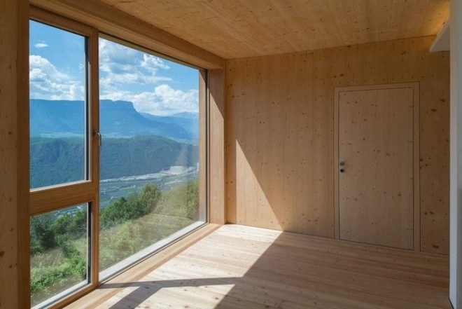 elisabeth and helmut uhl foundation, modo studio, glasshouse, solar thermal heating, salvaged materials, wood thermal-insulation envelope, energy costs, under-floor heating, hot air, wood, energy efficiency, compact building, sustainable building, plant cultivation, mountain views, panoramic views
