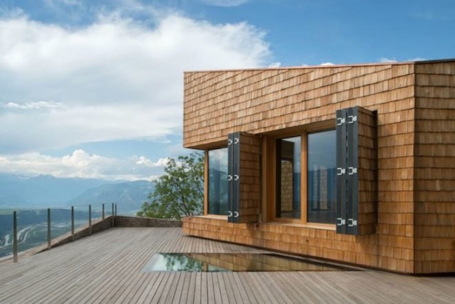 elisabeth and helmut uhl foundation, modo studio, glasshouse, solar thermal heating, salvaged materials, wood thermal-insulation envelope, energy costs, under-floor heating, hot air, wood, energy efficiency, compact building, sustainable building, plant cultivation, mountain views, panoramic views