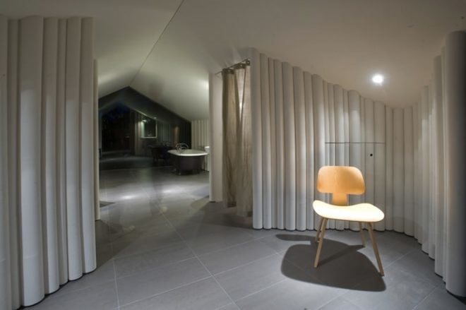 para-project, writer's workshop, syracuse, charles and ray eames chairs, claw foot tub, daybed, upcycled materials, upcycled cupboard tubing, cupboard tubing walls, loft conversion, renovated attic, converted attic, writer's studio and library,