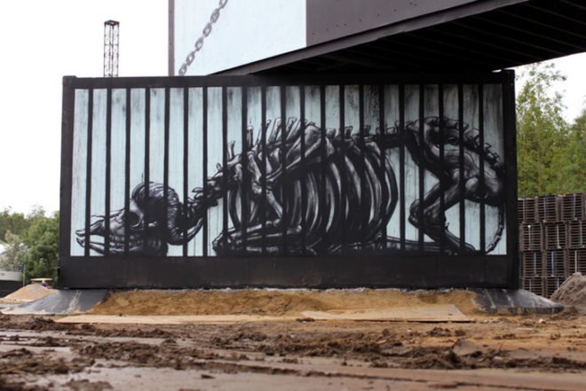 street art, captive animals, Rock Werchter Music Festival, street art, street artist DOA, caged animals, animal cruelty, Arne Quinze, Belgium