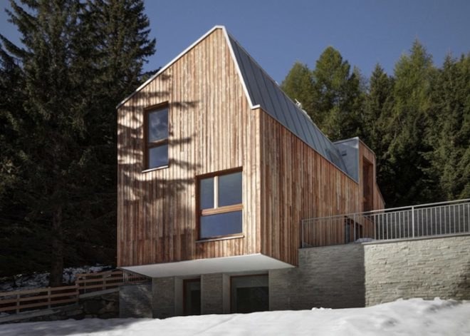 house in madesimo, ES-arch, Consalez Rossi Architetti Associati, zinc roof, lopsided roof, asymmetric roof, Rheinzink, untreated wood, larch, precast concrete panels, guest home, Madesimo, stone passageway, gray gneiss split stone