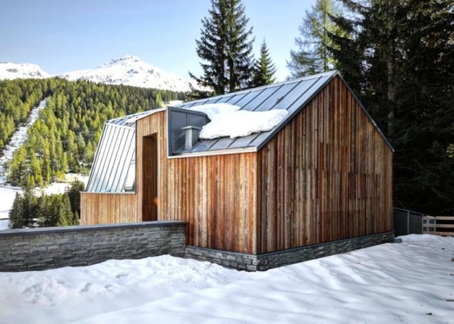 house in madesimo, ES-arch, Consalez Rossi Architetti Associati, zinc roof, lopsided roof, asymmetric roof, Rheinzink, untreated wood, larch, precast concrete panels, guest home, Madesimo, stone passageway, gray gneiss split stone