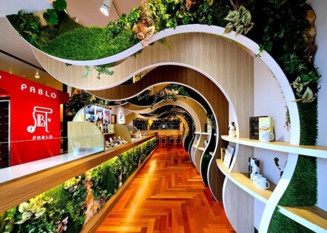 green wall, cheese tart, yokohama, pablo, rondo, hyongo, interior design, cheese shop design, restaurant design, exposed brick, organic-inspired walls, bakery, bakery interior design, japanese architecture